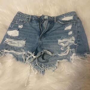 Distressed denim shorts